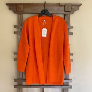 Cardigan . Orange color . NEW !
